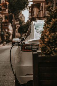 Electric car charging at a station