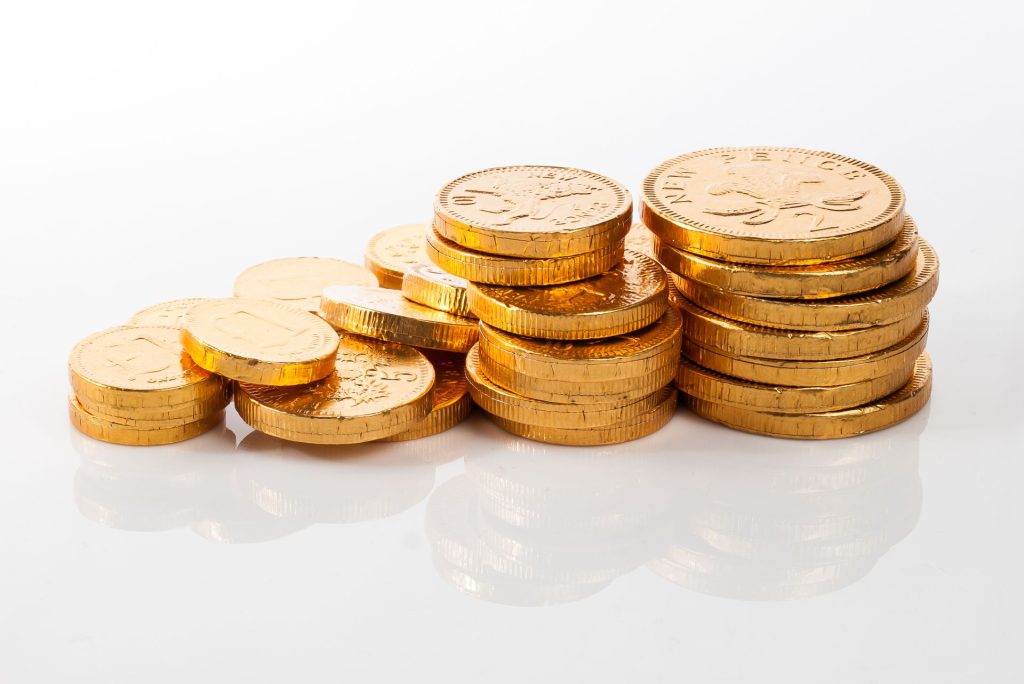 Gold coins on white background