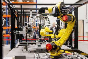 Industrial robot arm in a modern factory