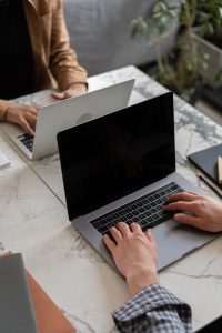 Person working on a laptop in an office