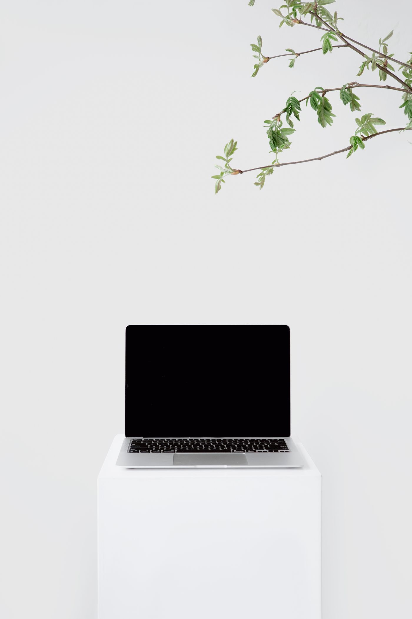Slim modern laptop on a clean desk with city view